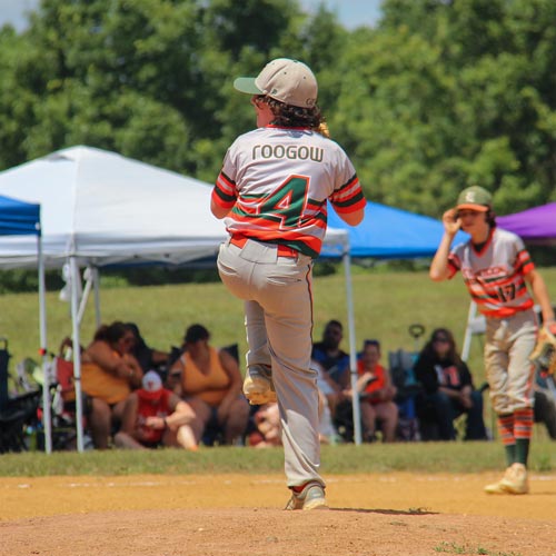 Pitcher Micah Roogow starts his hip lean toward home after reaching his balance point.